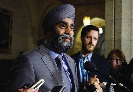 Defence Minister Harjit Sajjan talks with media in Ottawa on Tuesday, Dec. 15, 2015. THE CANADIAN PRESS IMAGES/Matthew Usherwood
